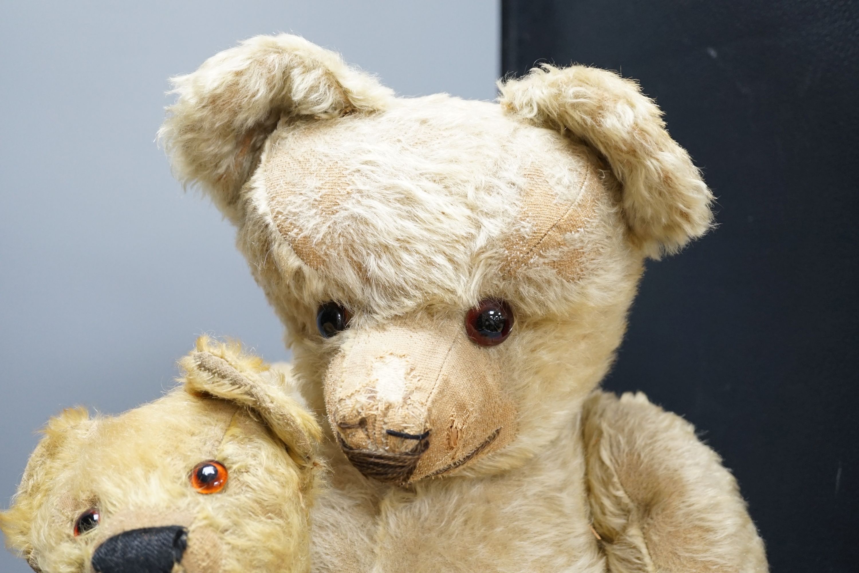 A large 1920's Chad Valley Teddy bear, 75cm, together with another 1920's Chad Valley Teddy bear, play-worn